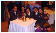With the Centennial bell